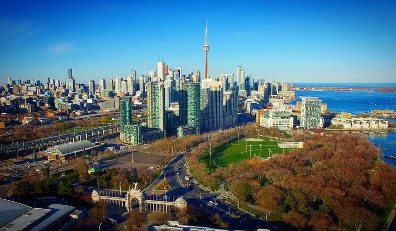Aerial view of Exhibition Place and the Toronto skyline, site of the Caribbean Carnival Grand Parade