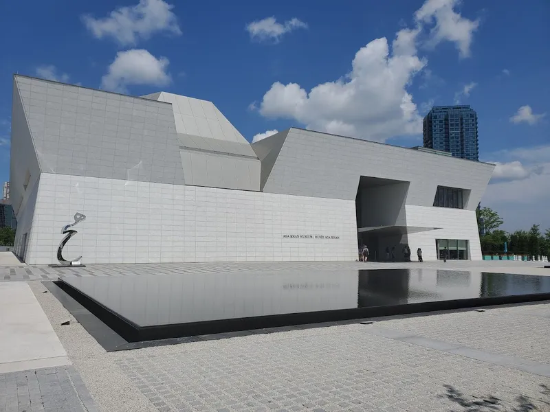 Aga Khan Museum — modern building facade with geometric glass and stone
