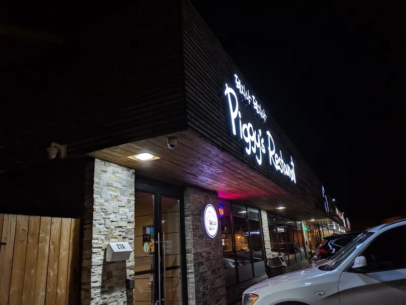 Piggy's Island Korean BBQ cast-iron lid grill with pork belly