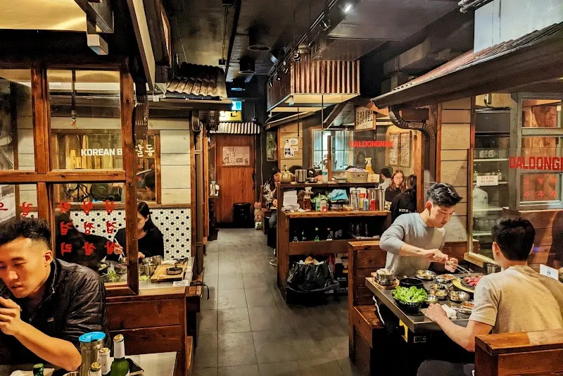 Daldongnae Korean BBQ charcoal grilling and banchan selection