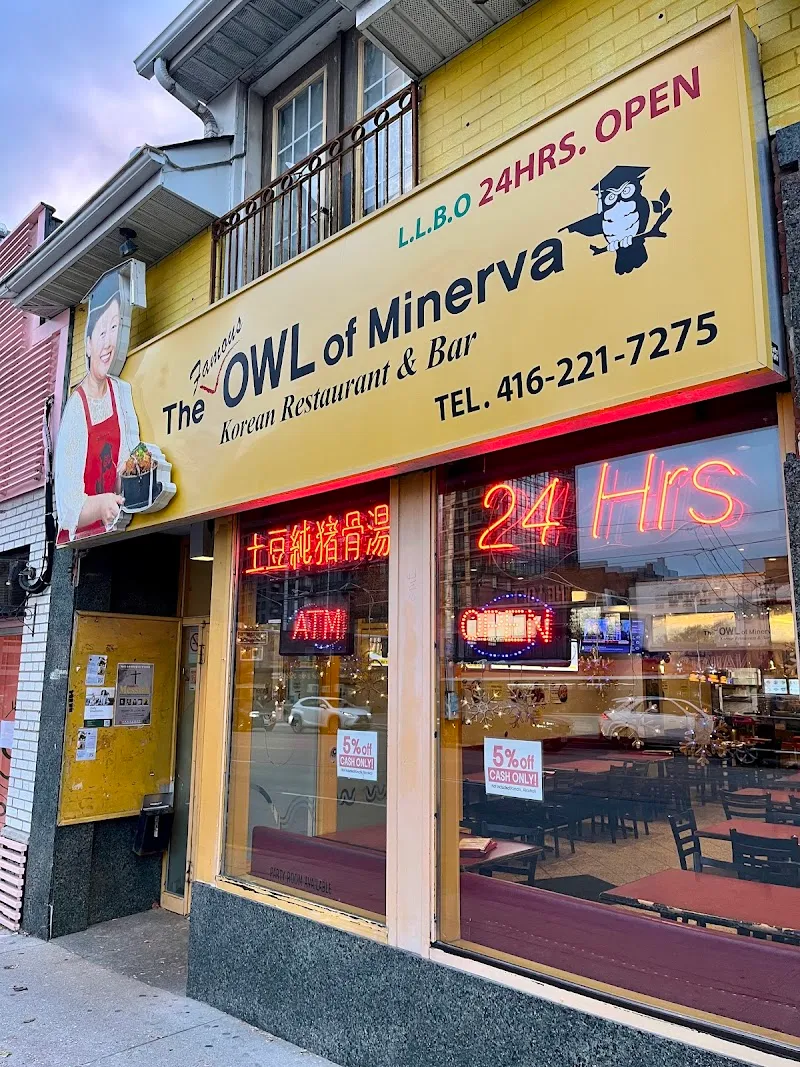 The Famous Owl of Minerva restaurant storefront and dining ambiance